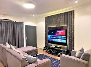 Deluxe Apartment, Balcony, City View | Living area | Flat-screen TV - 1118 Serenity Residence (Abuja)