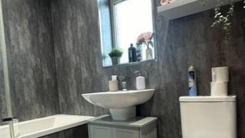 Hair dryer, towels, soap, toilet paper