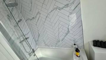 Hair dryer, towels, soap, toilet paper