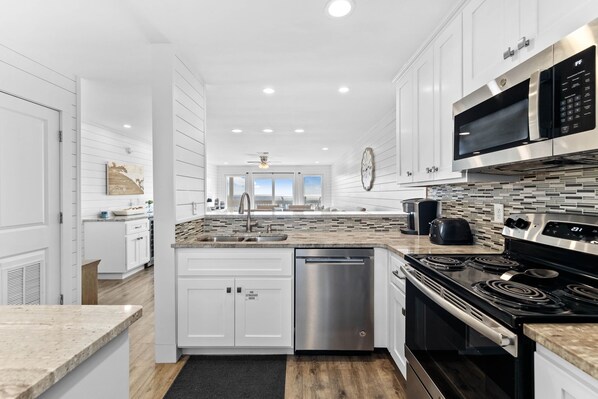 Fridge, microwave, oven, stovetop - Secluded Gulf-Front Condo | Breathtaking Views | Pool | Steps to Private Beach (Panama City Beach)