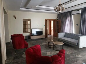 Deluxe Apartment, Balcony, City View | Living area