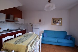 Apartment, Balcony | Private kitchen - Casa Seppia In Budoni (Budoni)