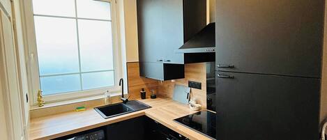 Fridge, microwave, oven, cookware/dishes/utensils