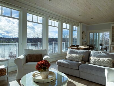 Lakefront Home on Washademoak Lake with Dock and 255 ft of Water Frontage.    