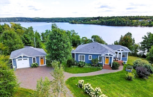 Lakefront Home on Washademoak Lake with Dock and 255 ft of Water Frontage.    