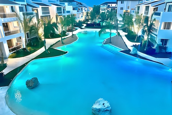 Apartment | Pool | 5 outdoor pools, open 8:00 AM to 8:00 PM, pool loungers
