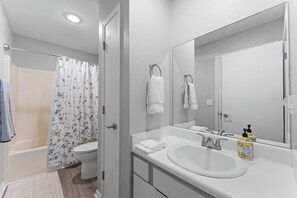 Hair dryer, towels, soap, toilet paper
