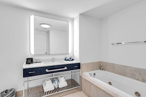 Shower, jetted bath, hair dryer, bidet