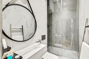 Shower, hair dryer, towels, soap