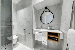 Shower, hair dryer, towels
