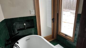 Shower, towels, soap, toilet paper