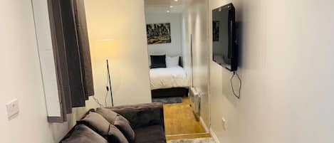 1 dormitorio, tabla de planchar con plancha, wifi