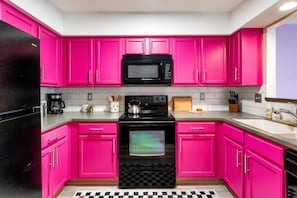 Coffee/tea maker, fridge, microwave, oven