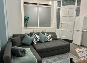 Apartamento | Área de estar | TV