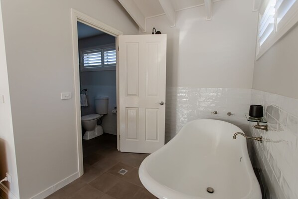 Shower, hair dryer, towels, toilet paper