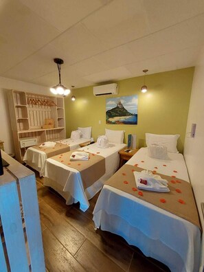 Deluxe Triple Room | In-room safe, blackout drapes, soundproofing, iron/ironing board
