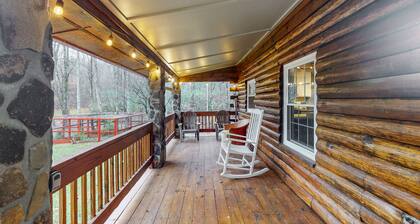 Charming log cabin with serene views, private pond, & cozy fireplace