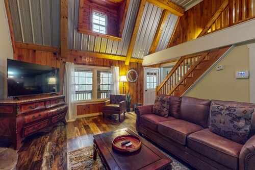 Charming log cabin with serene views, private pond, & cozy fireplace