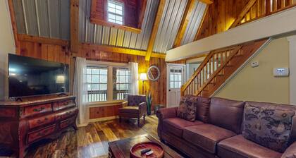 Charming log cabin with serene views, private pond, & cozy fireplace