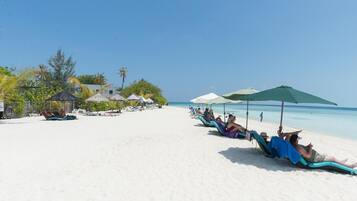 On the beach, white sand