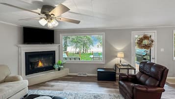 Smart TV, fireplace, DVD player, books