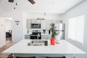 Coffee/tea maker, fridge, microwave, oven