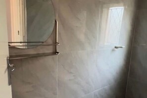 Shower, hair dryer, towels, soap - Mountain View 2 Bedroom House Holiday Home
(Harare)