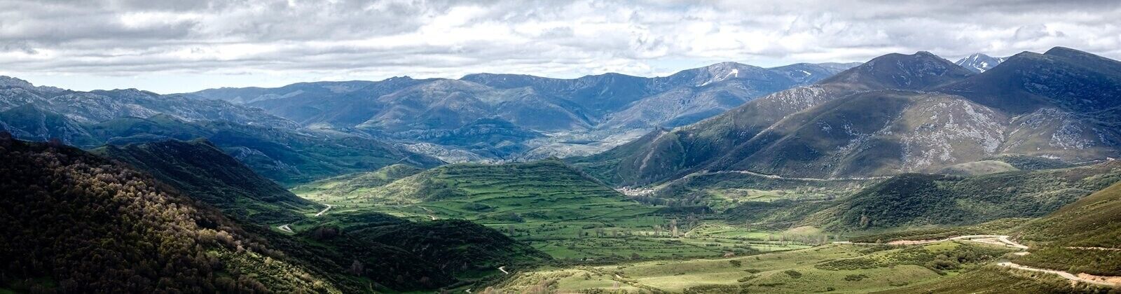 A mountainous landscape with a valley.