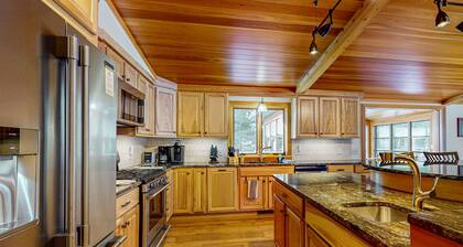 Charming Waterfront Home w/ Dock, Fire pit, WIFI, near Town & Trails