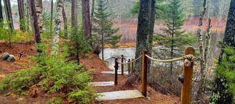 Charming Waterfront Home w/ Dock, Fire pit, WIFI, near Town & Trails