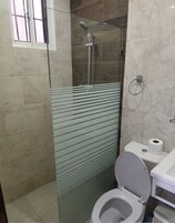 Family Quadruple Room, 1 Bedroom | Bathroom | Shower, rainfall showerhead, towels, soap