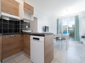 Fridge, microwave, dishwasher, coffee/tea maker