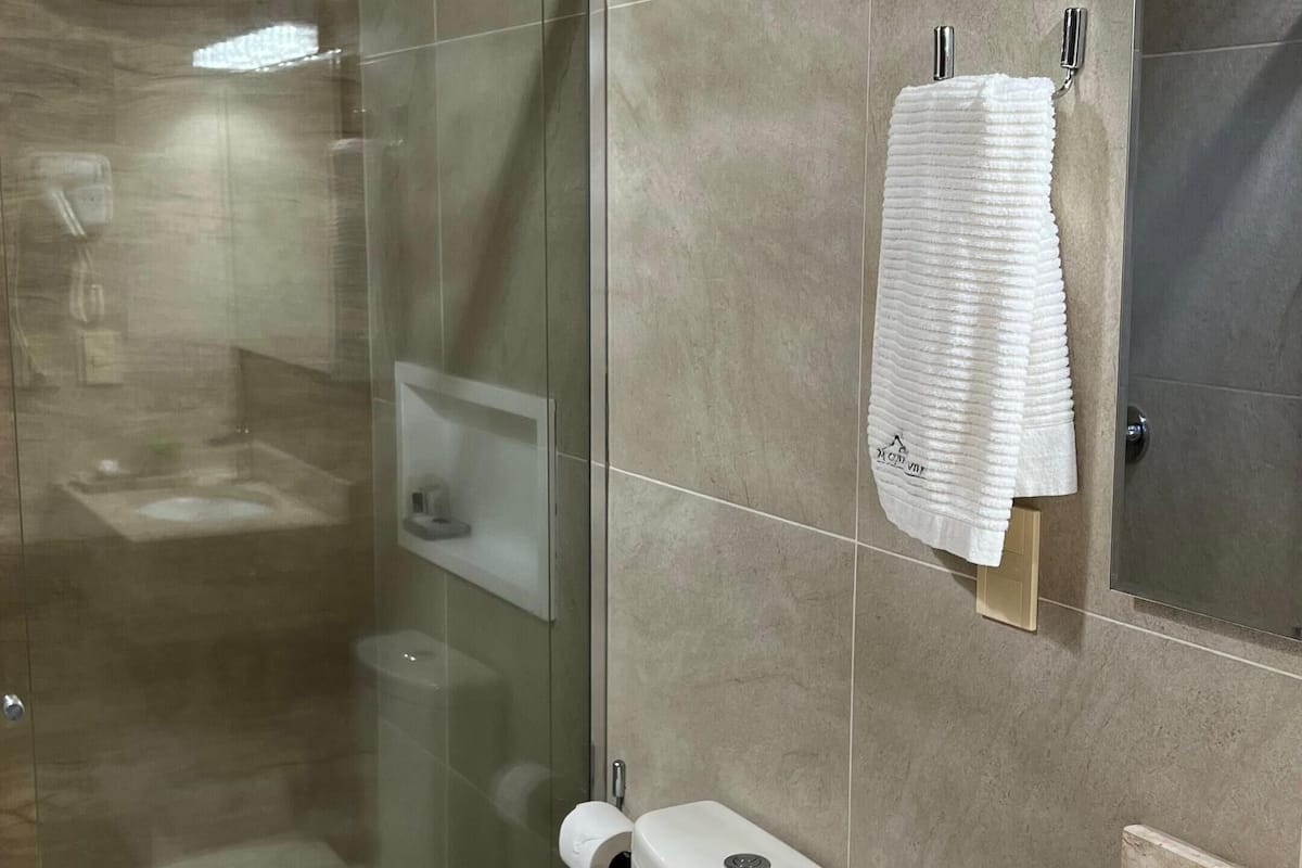 Cabin, Multiple Beds | Bathroom | Shower, towels, soap, shampoo