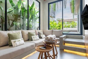 Villa | Living area | Flat-screen TV