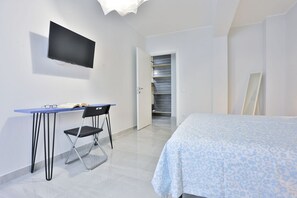 1 habitación, tabla de planchar con plancha, wifi y ropa de cama 