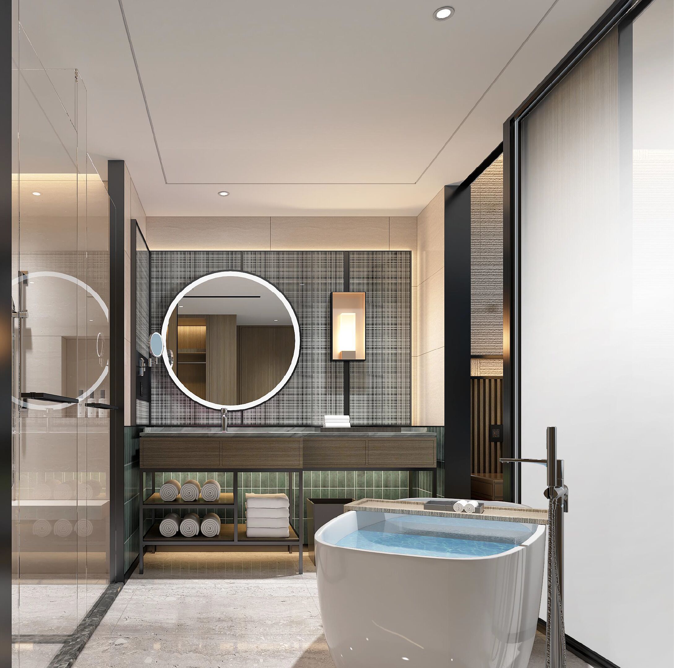 Un baño moderno con un espejo redondo grande, una bañera y un tocador con un espejo grande.