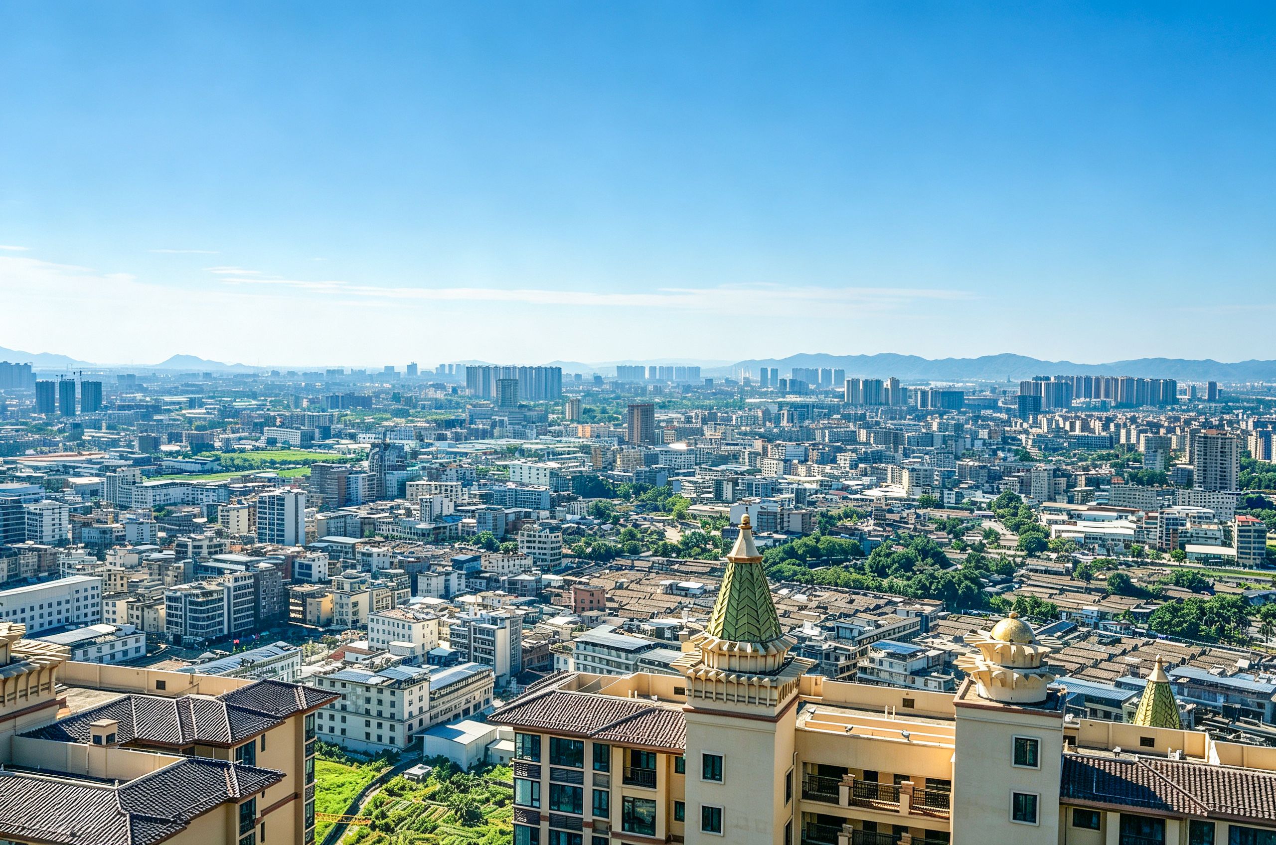 A cityscape with a mix of high-rise buildings and traditional architecture, including a prominent building with a green dome and golden spire.