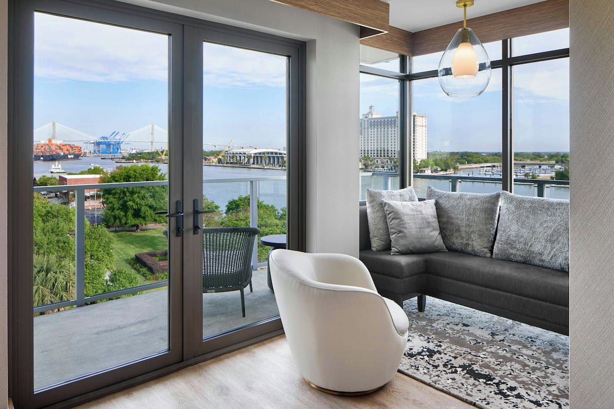 Suite, 1 Bedroom, Balcony, River View | In-room safe, desk, laptop workspace, blackout drapes