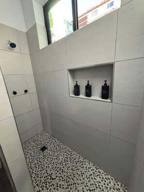 Shower, hair dryer, towels, soap