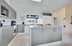 Fridge, dishwasher, coffee/tea maker