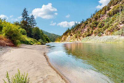 Tranquil riverfront getaway, private pool, seasonal fruit trees, & fishing