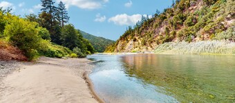 Tranquil riverfront getaway, private pool, seasonal fruit trees, & fishing