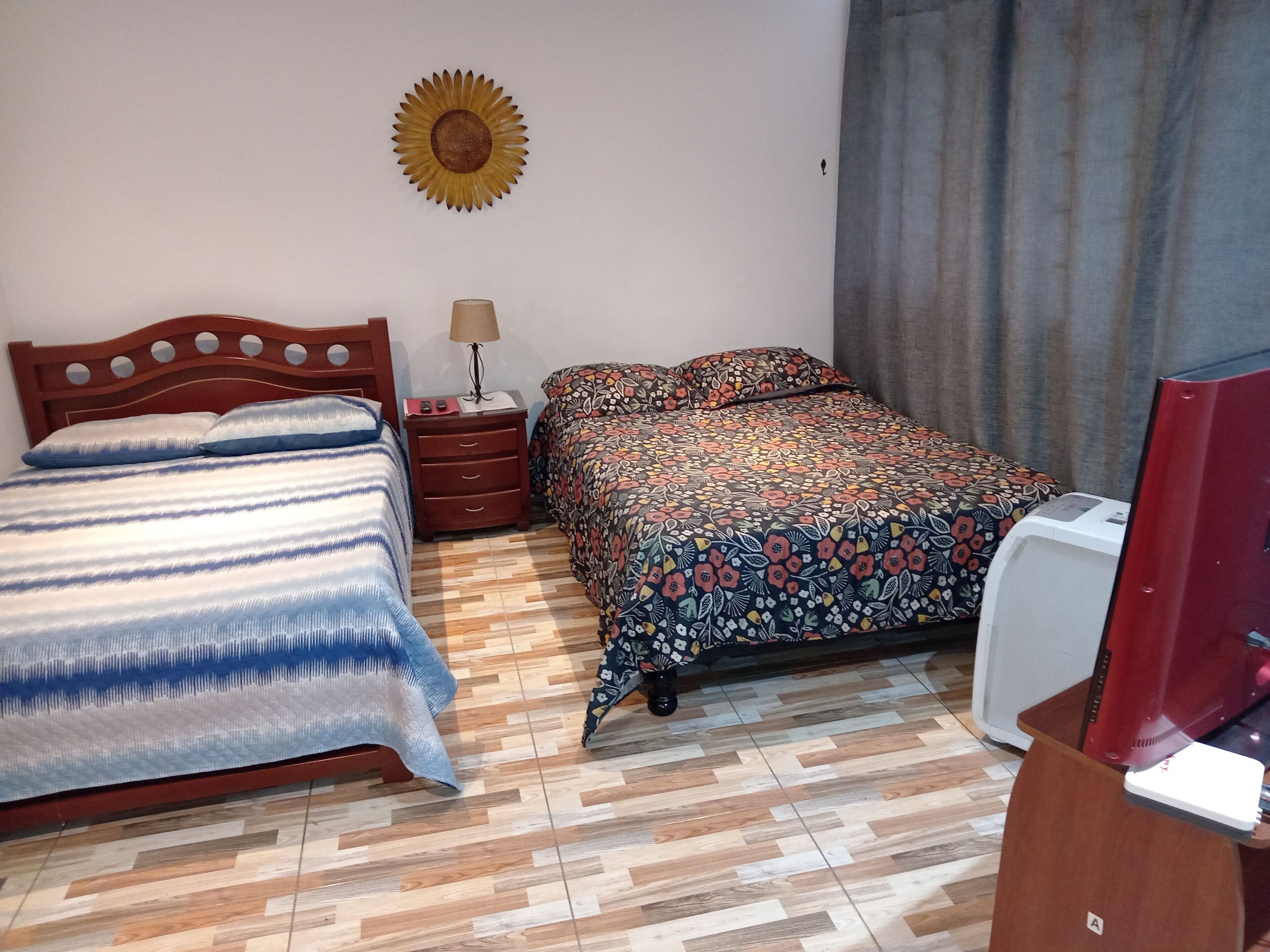 Standard Quadruple Room, City View | Iron/ironing board, free WiFi