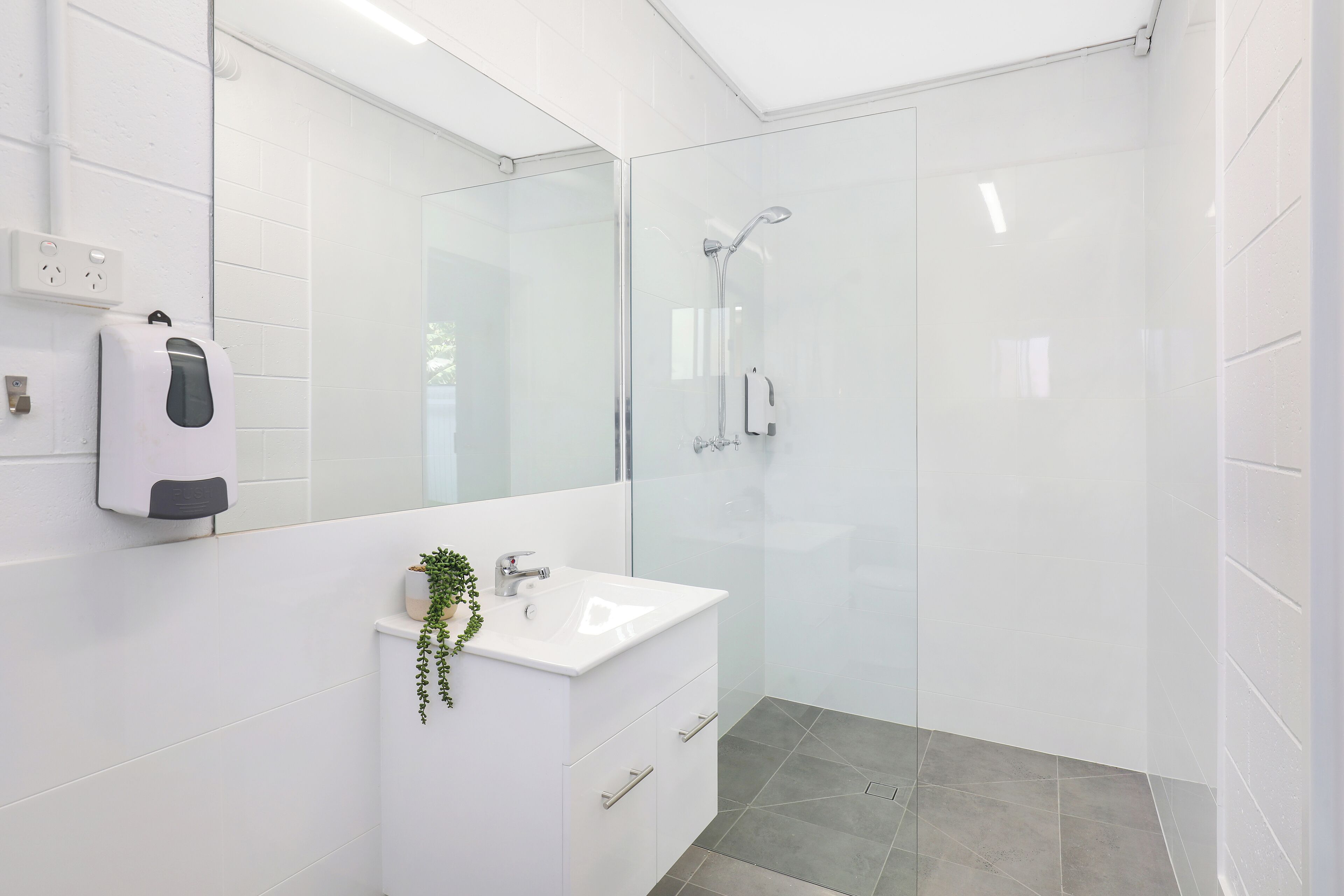 Shower, towels, soap, toilet paper