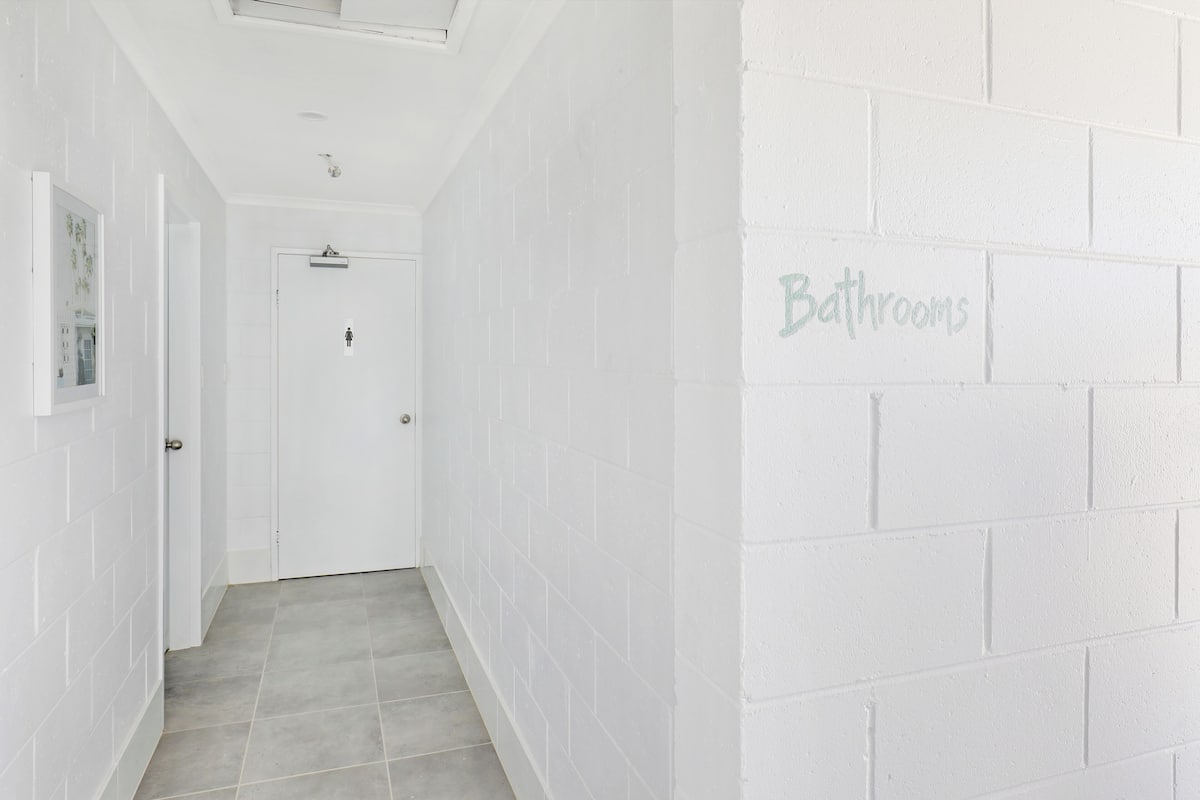 Shower, towels, soap, toilet paper