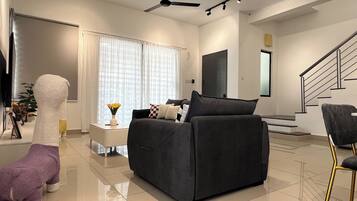 Family House, Patio, Corner | Living area | Flat-screen TV