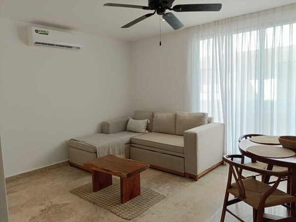 Appartement, 1 chambre | Aire de séjour