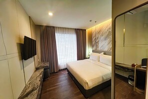 Chambre Deluxe Double ou avec lits jumeaux | Wi-Fi gratuit