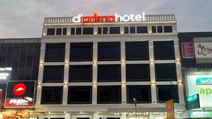 A hotel named 'd'prima hotel' with a modern facade and multiple windows. - d'primahotel PIK Jakarta (Jakarta)
