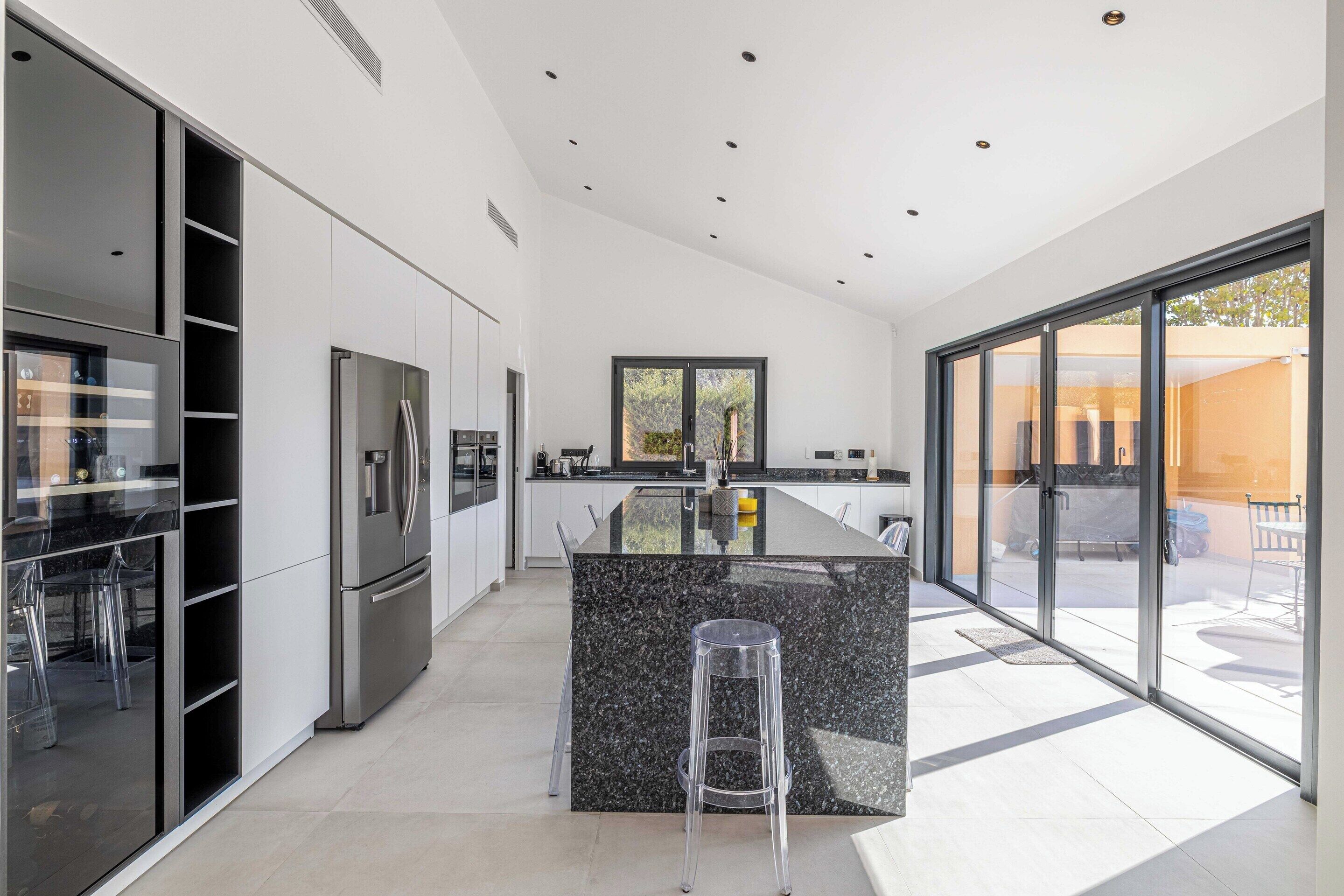 Villa | Private kitchen | Fridge, microwave, oven, stovetop